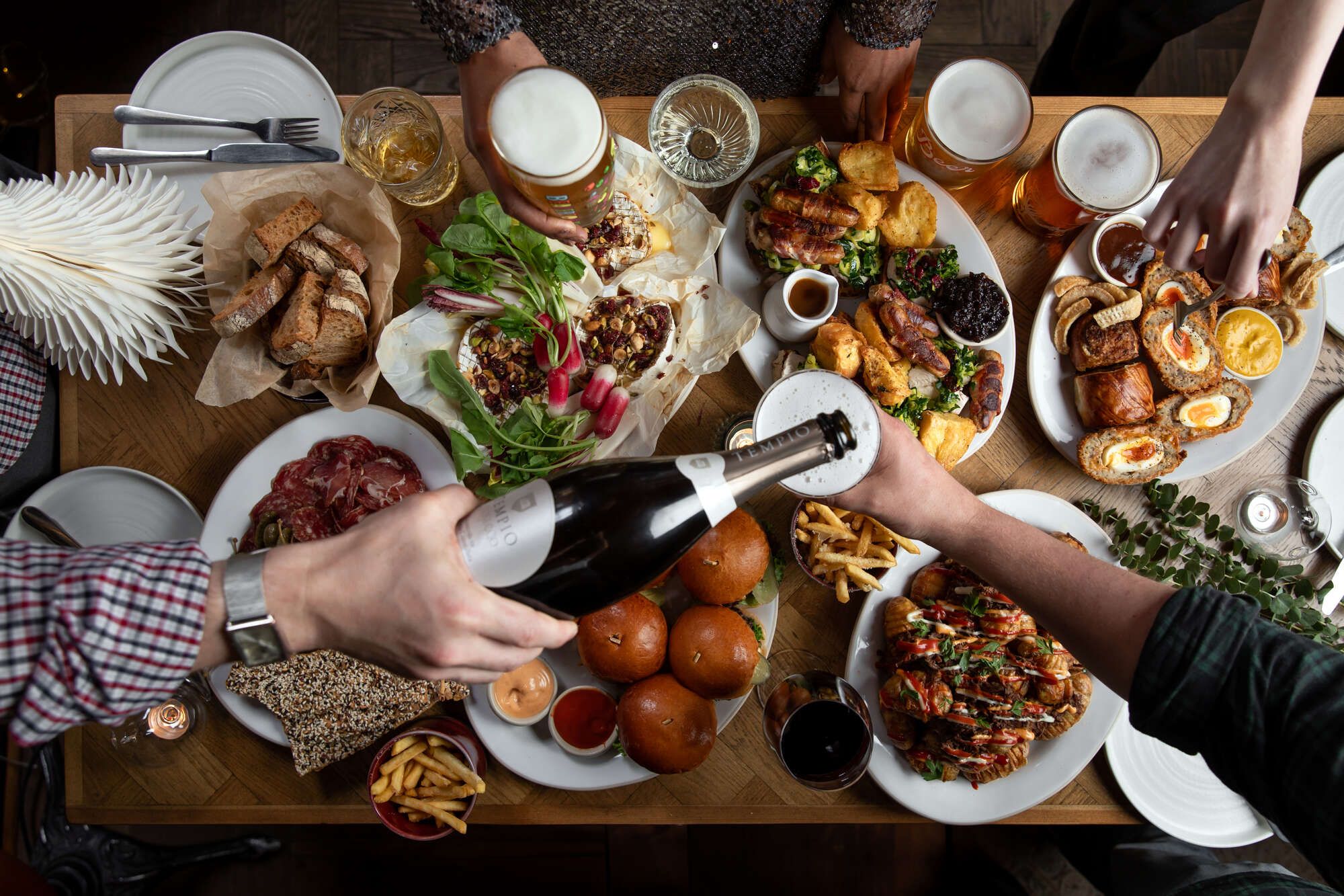 Table laden with Christmas food.